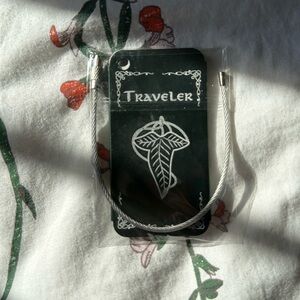 OwlCrate metal luggage tag